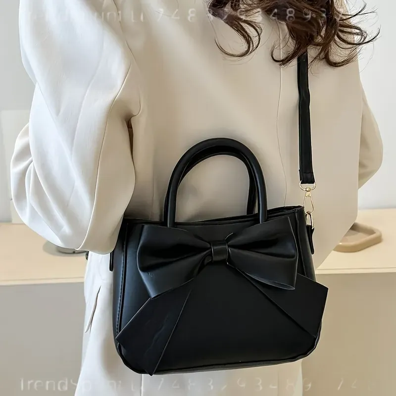 エレガントな黒のリボンハンドバッグ、ゴールドの金具と取り外し - Women Bags Work のレビューと価格